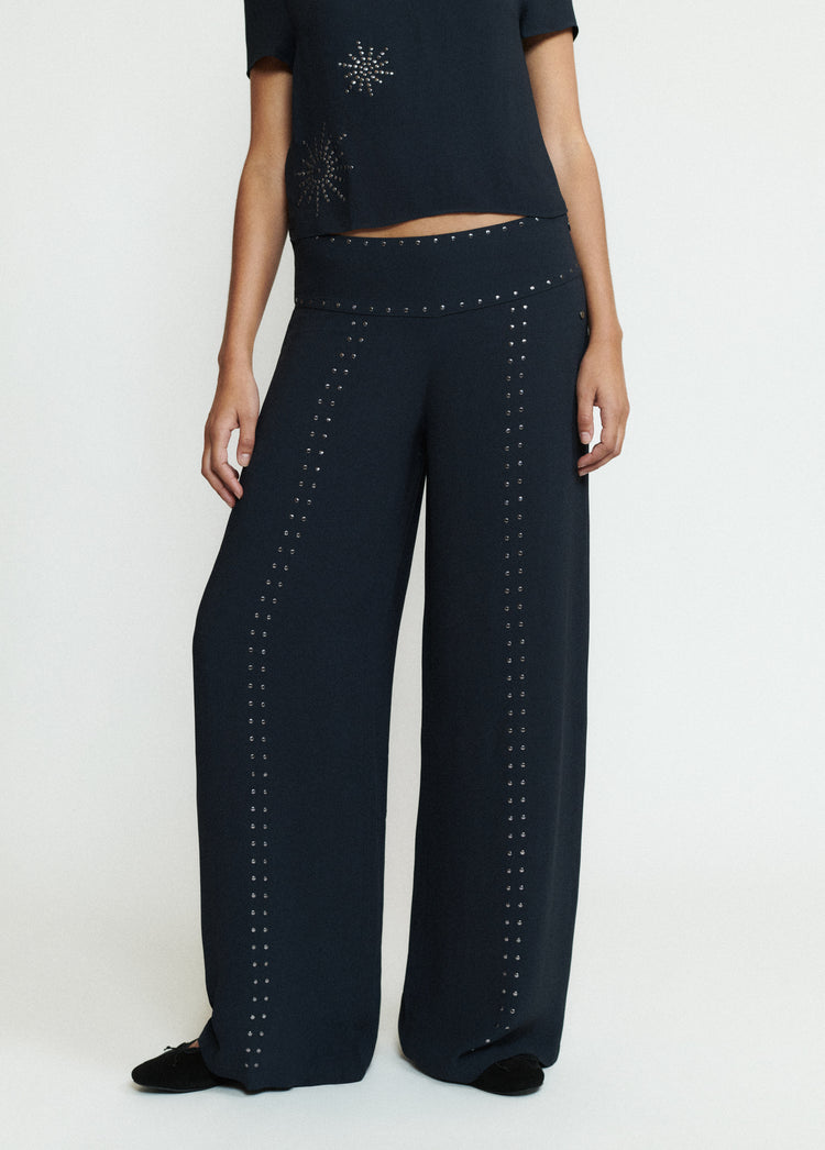 Pantalón largo tachas