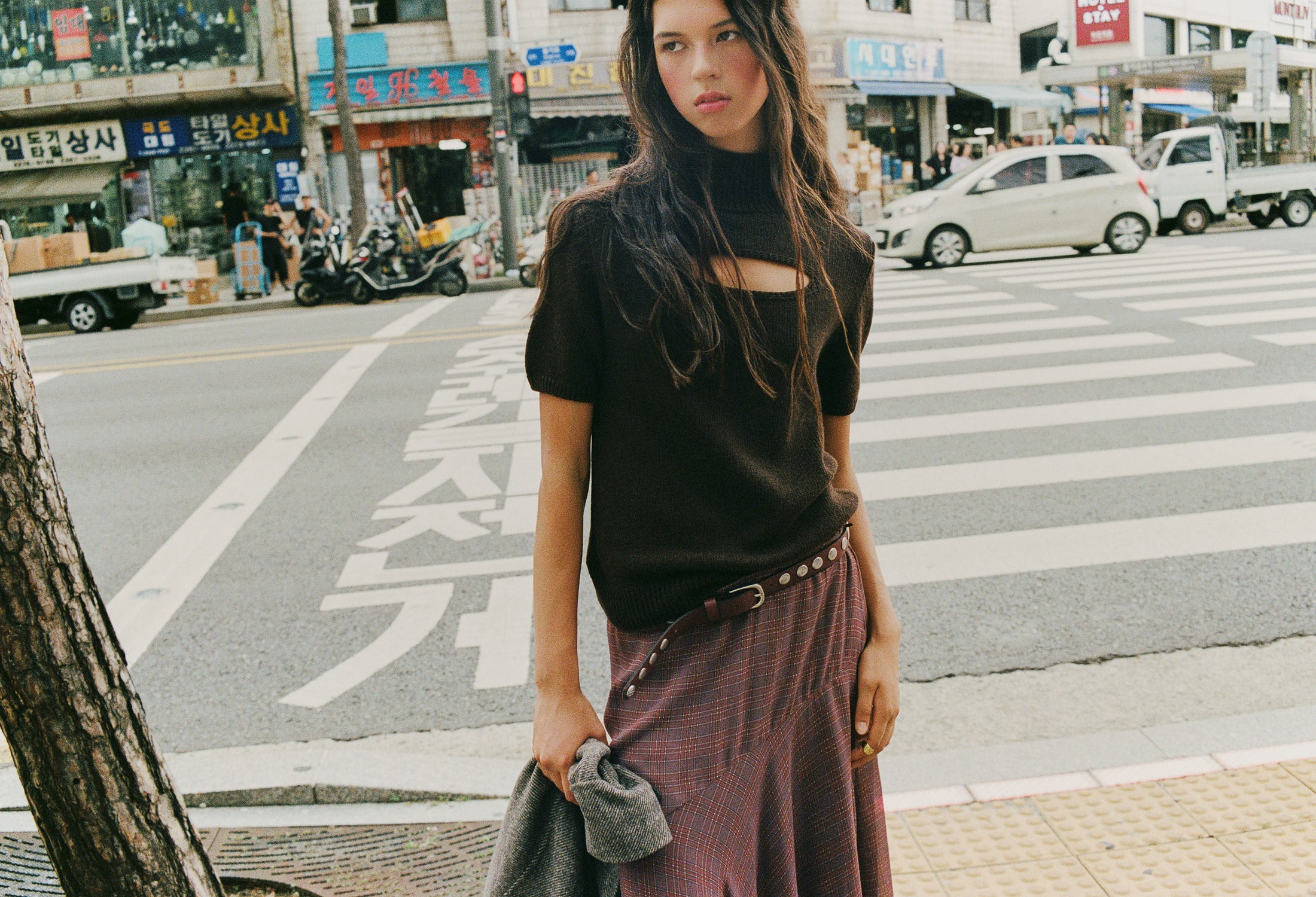 Short brown jumper with cut-out details