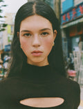 Short brown jumper with cut-out details