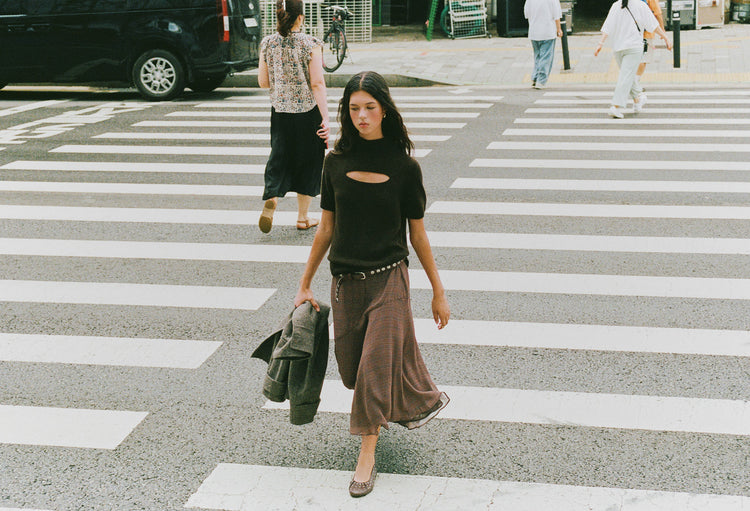 Long plaid skirt with an asymmetric hem