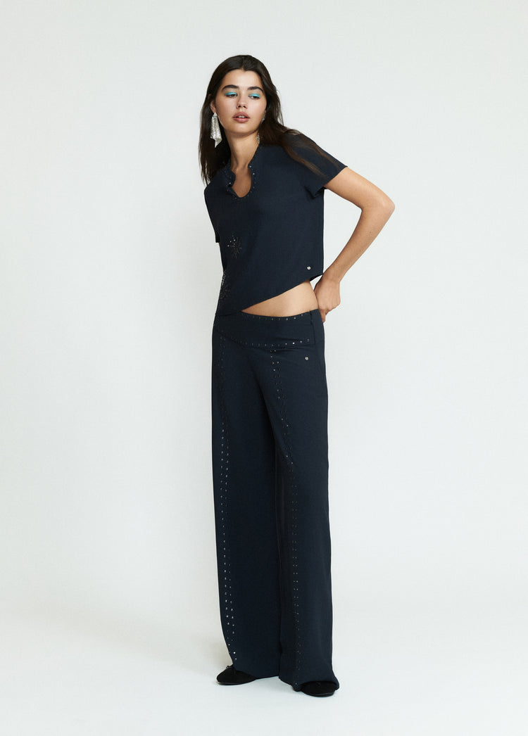 Pantaloni lunghi con borchie