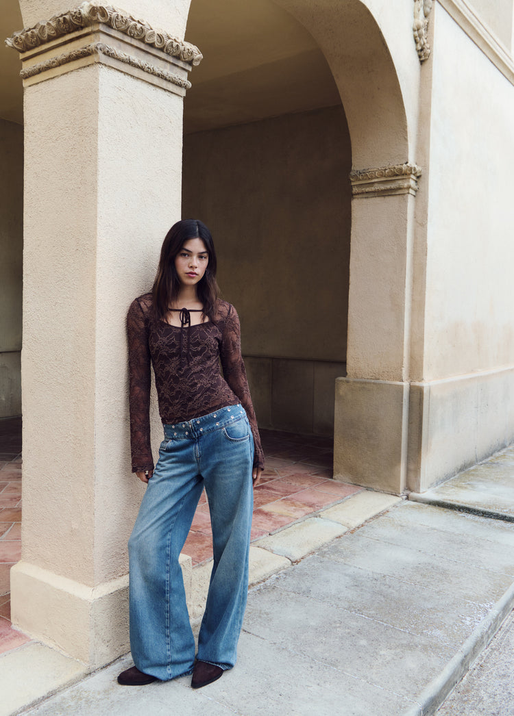 Studded embroidered waistband jeans