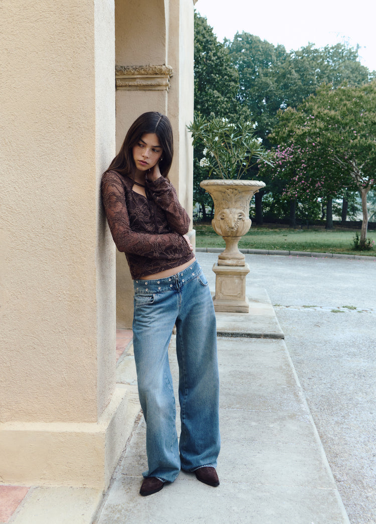 Studded embroidered waistband jeans