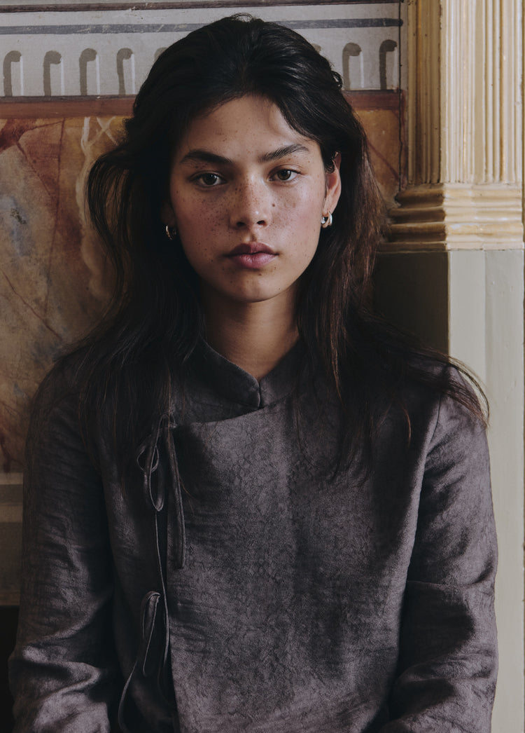 Jacquardblouse met strikdetails