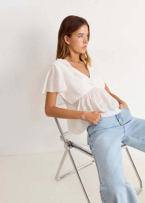 Blusa manica corta con volant