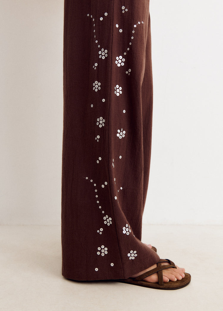 Pantalon fluide avec détails sequins sur le côté