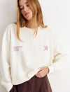 Sudadera print glitter estrella