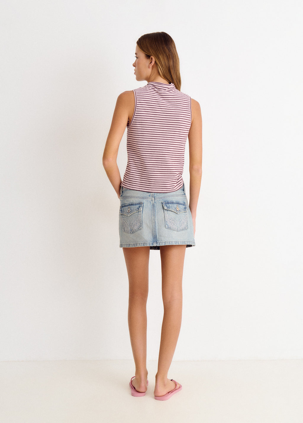 Camiseta raya tejida cuello abotonado