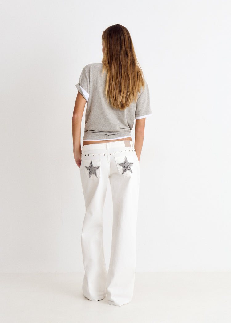 Low-rise pants with glitter stars and studs