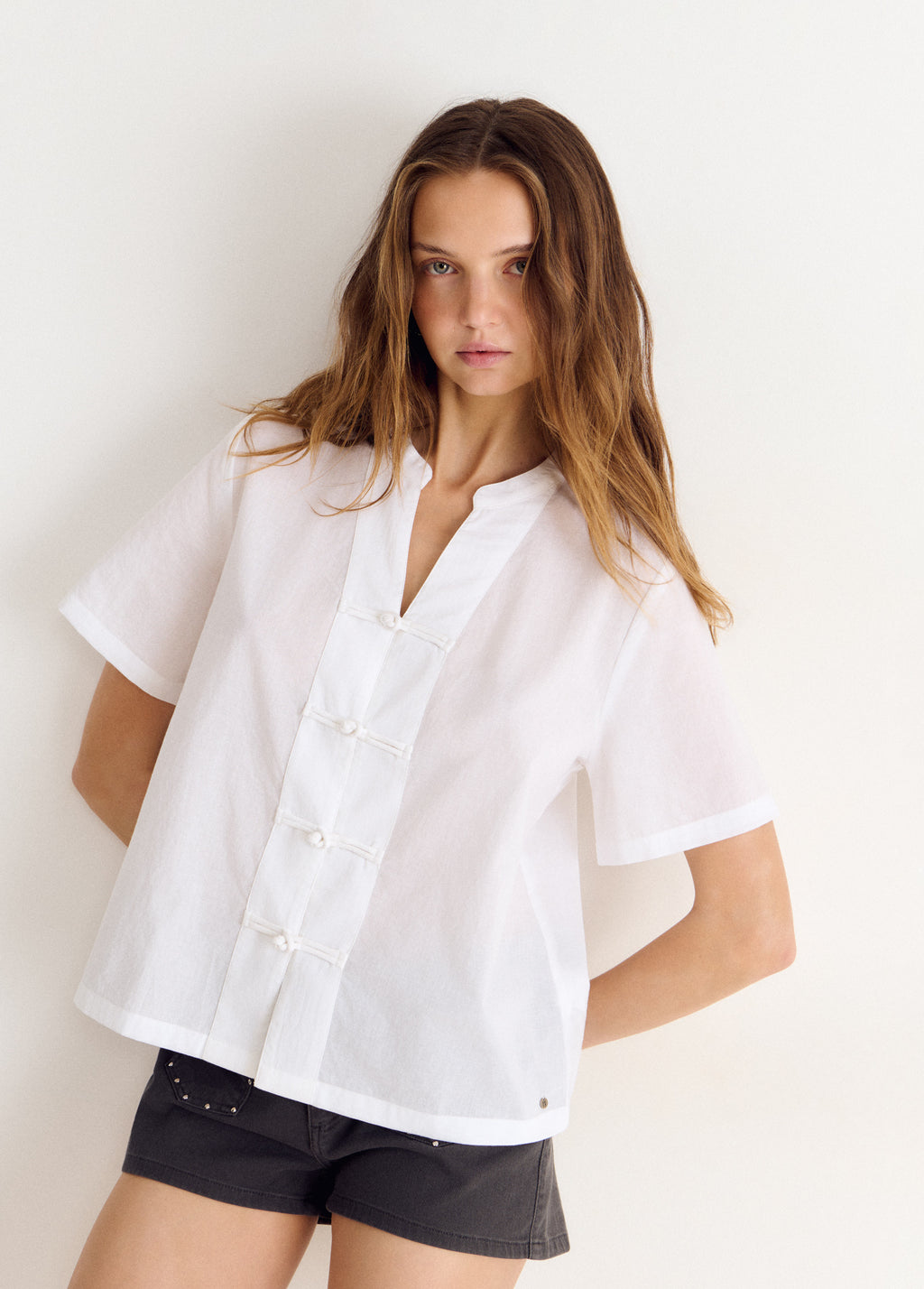 Blusa manga corta detalle japonés
