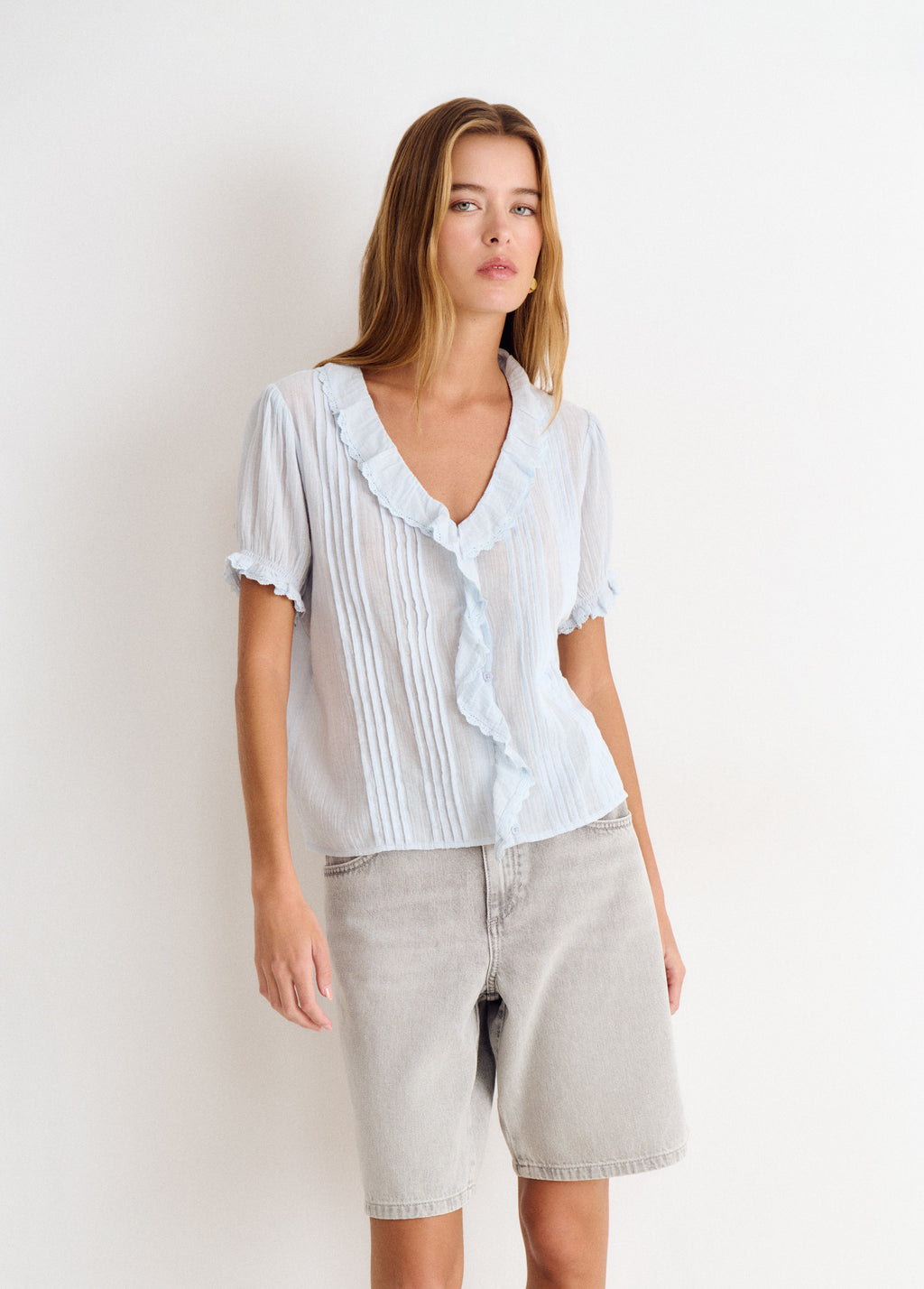 Blusa con volant