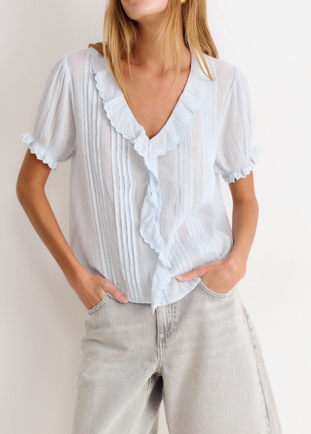 Blusa con volant