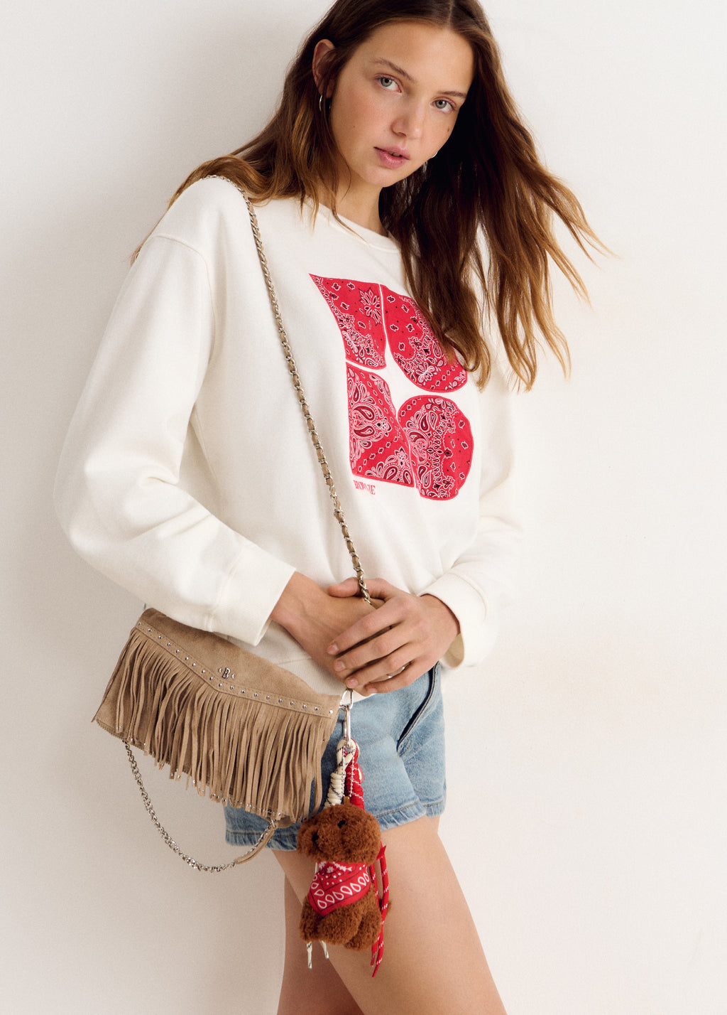 Leather flap bag with fringes
