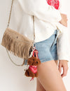 Leather flap bag with fringes