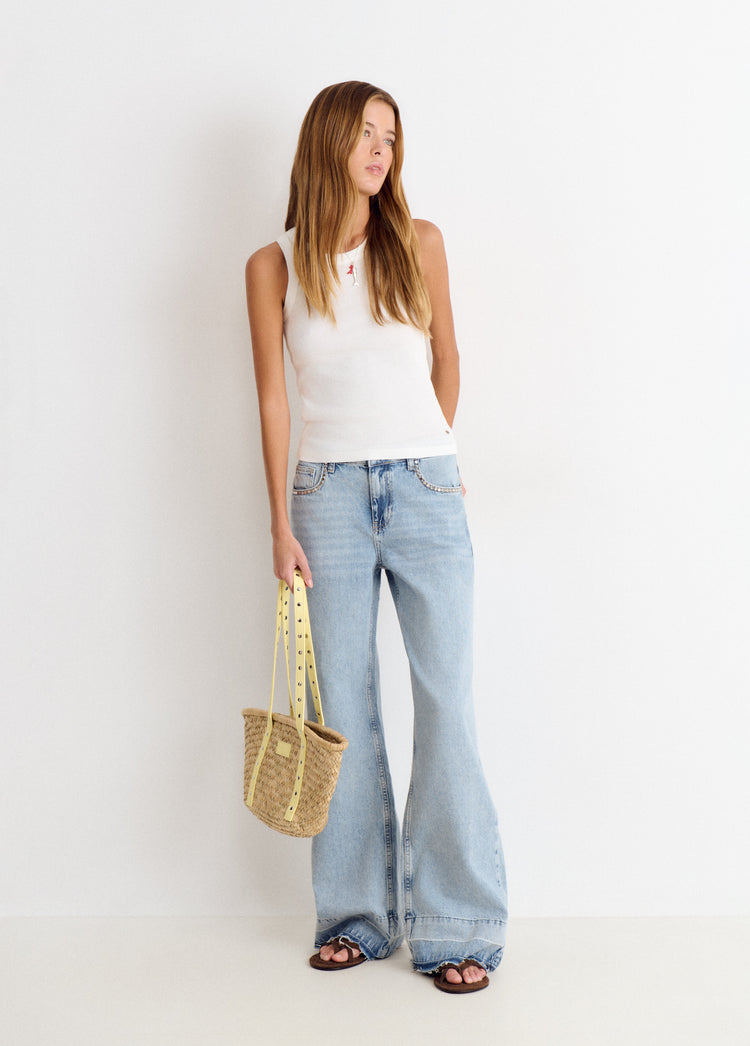 Relaxed jeans with studs and folded hem