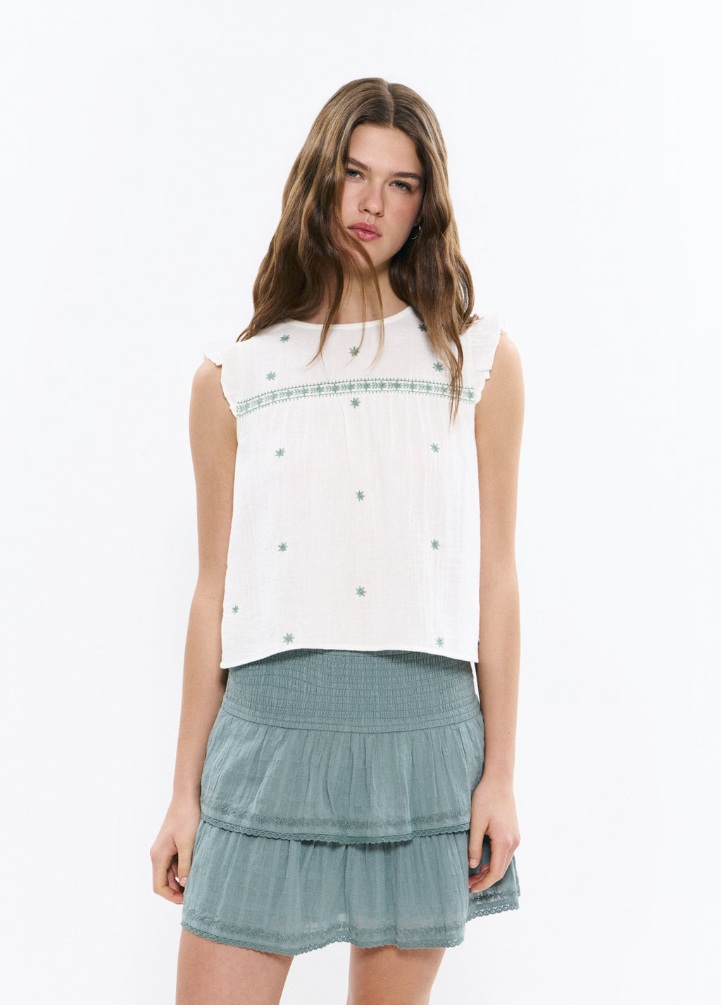 Blusa dobleta amb brodats