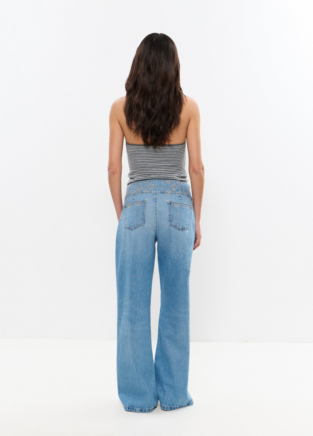 Wide embroidered waistband jeans