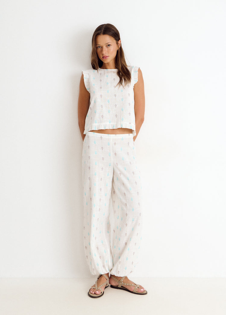 Multi-position embroidered blouse