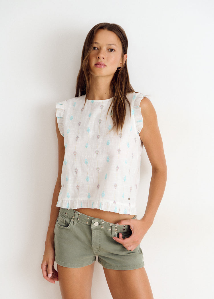Multi-position embroidered blouse