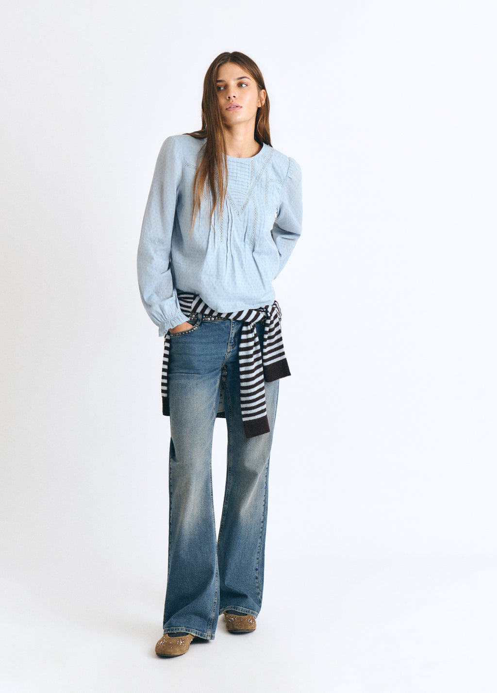 Blouse with lace and a high neckline