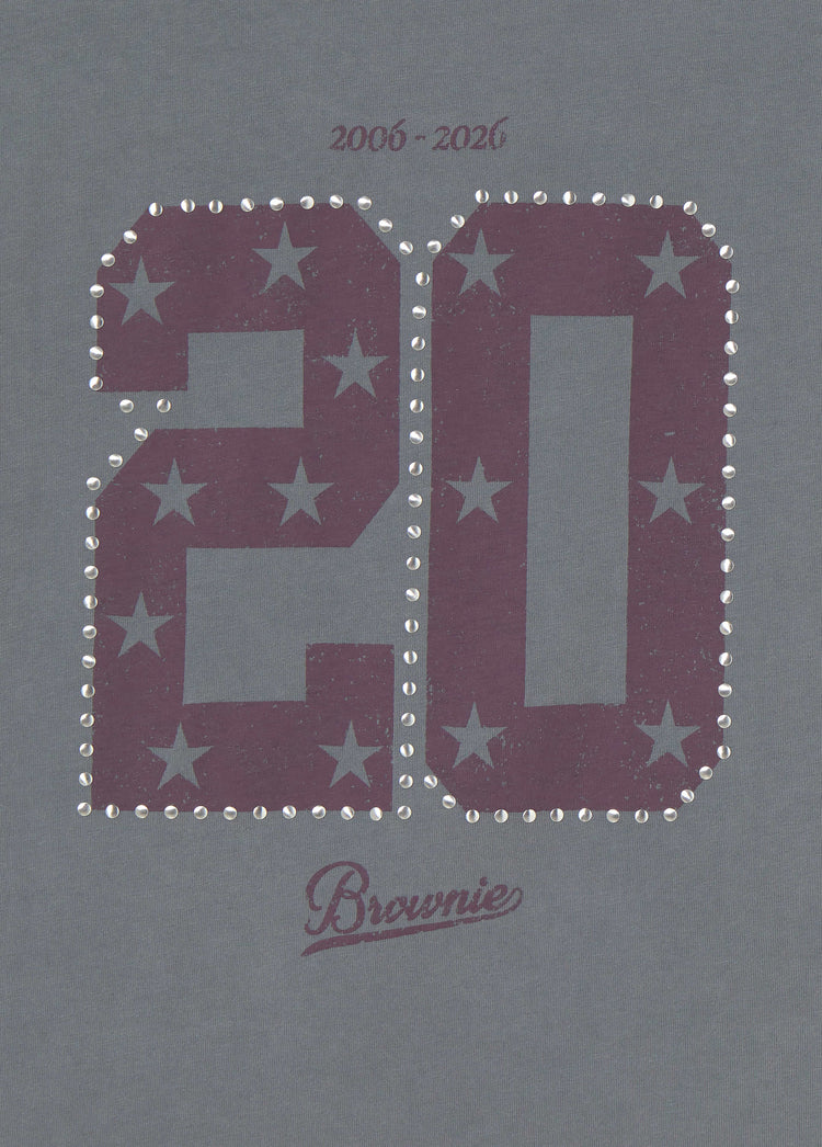 T-shirt anniversario con borchie