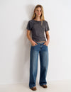 Jeans tachas cruz