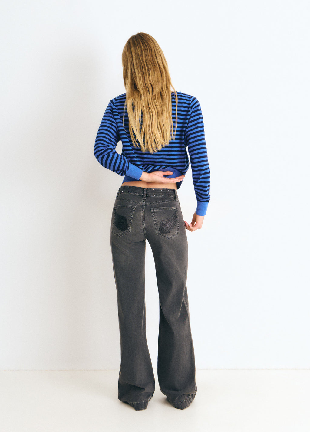 Jeans culotte con ali glitter