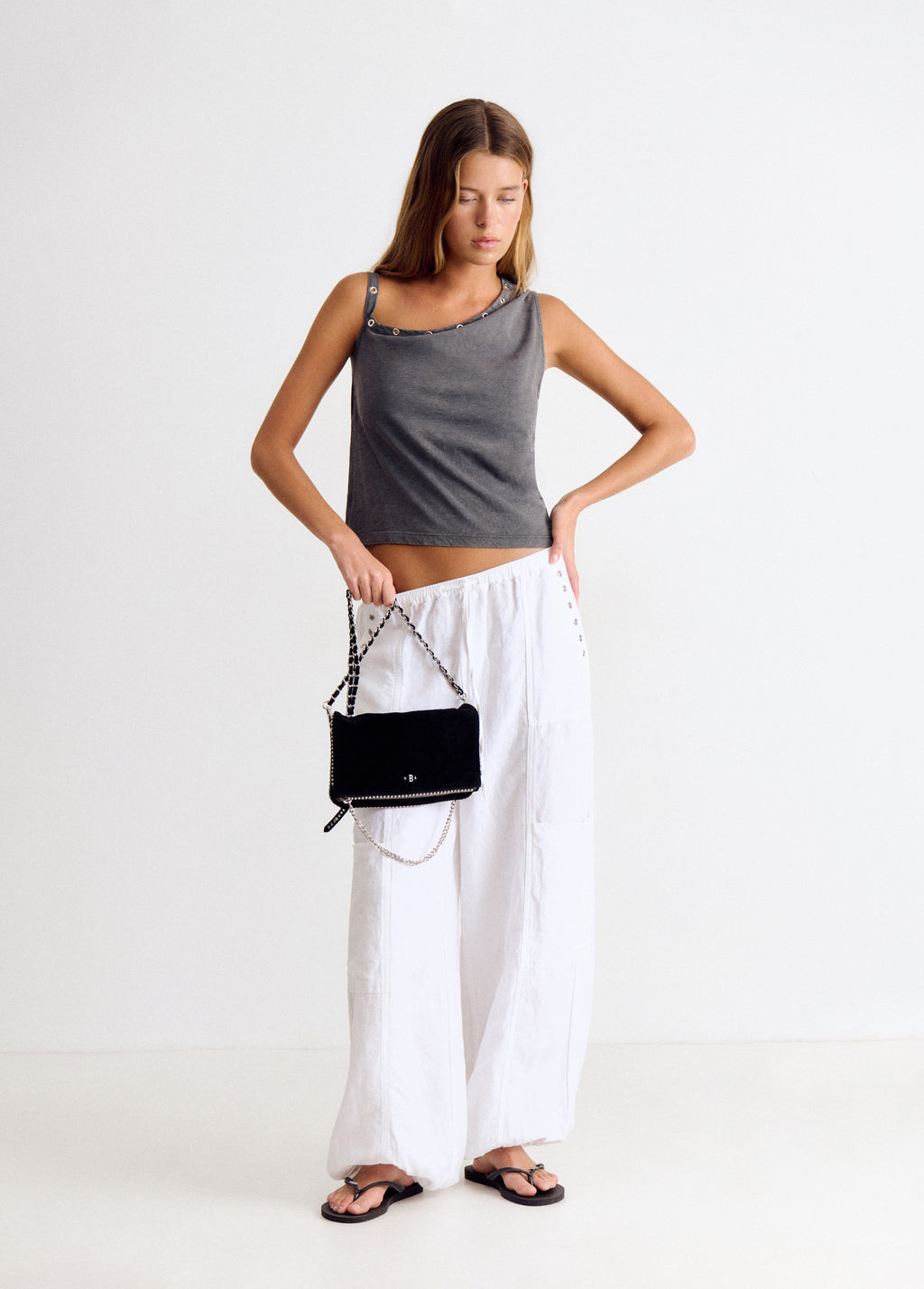 Bolso solapa bolitas serraje