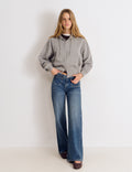 Jeans bolsillo frontal bordado