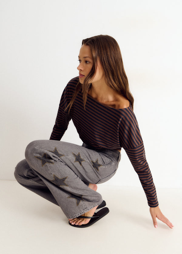 Jeans estrellas tachas lateral