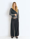 Pantalon bouffant à taille cloutée