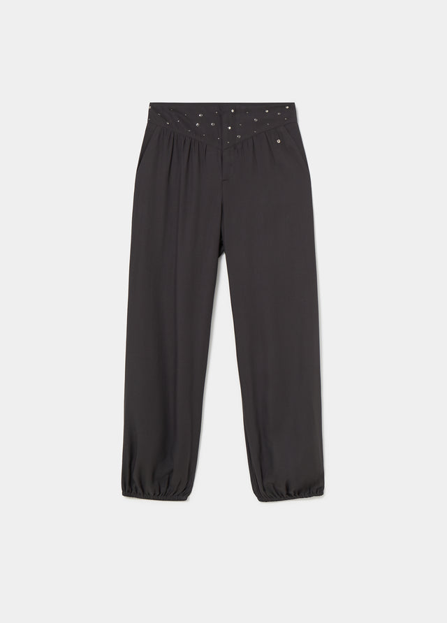 Pantalon bouffant à taille cloutée