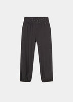 Pantalón bombacho de color antracita con cintura decorada con tachas plateadas