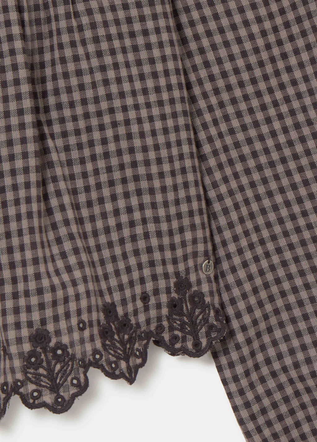 Blouse met ruitjes en geborduurde zoom