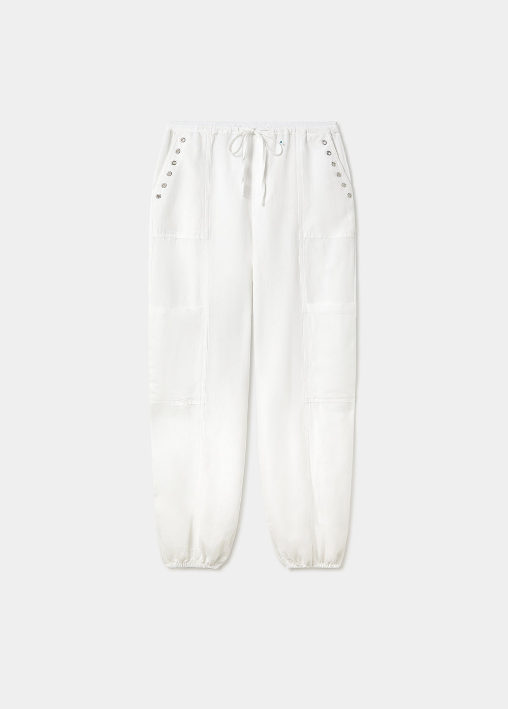 Pantalón bombacho de lino en blanco con detalle de tachas en los bolsillos