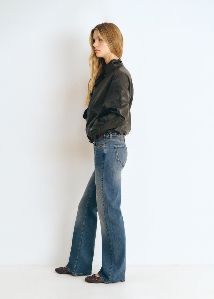 Jeans con borchie e vita alta