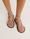 Flat sandals with ring straps