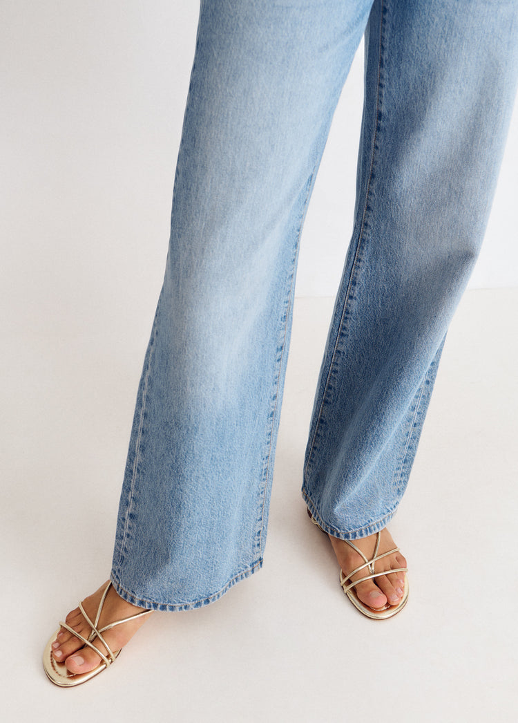 Flat sandals with tied straps
