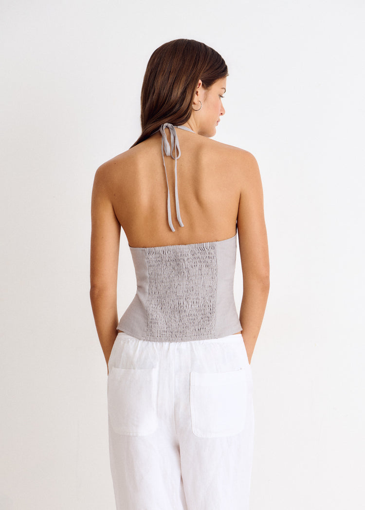 Linen halter top with mother-of-pearl buttons