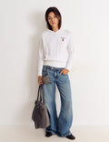 Braided embroidered sweater