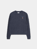 Knitted sweater with an embroidered dog design