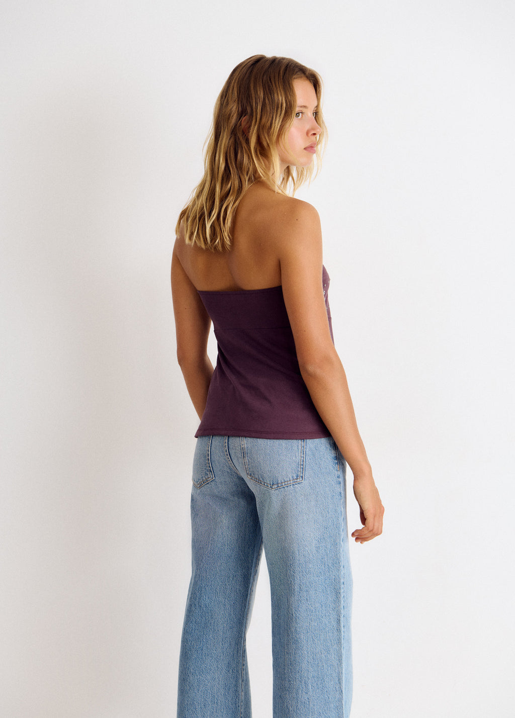 Top bandeau com tachas