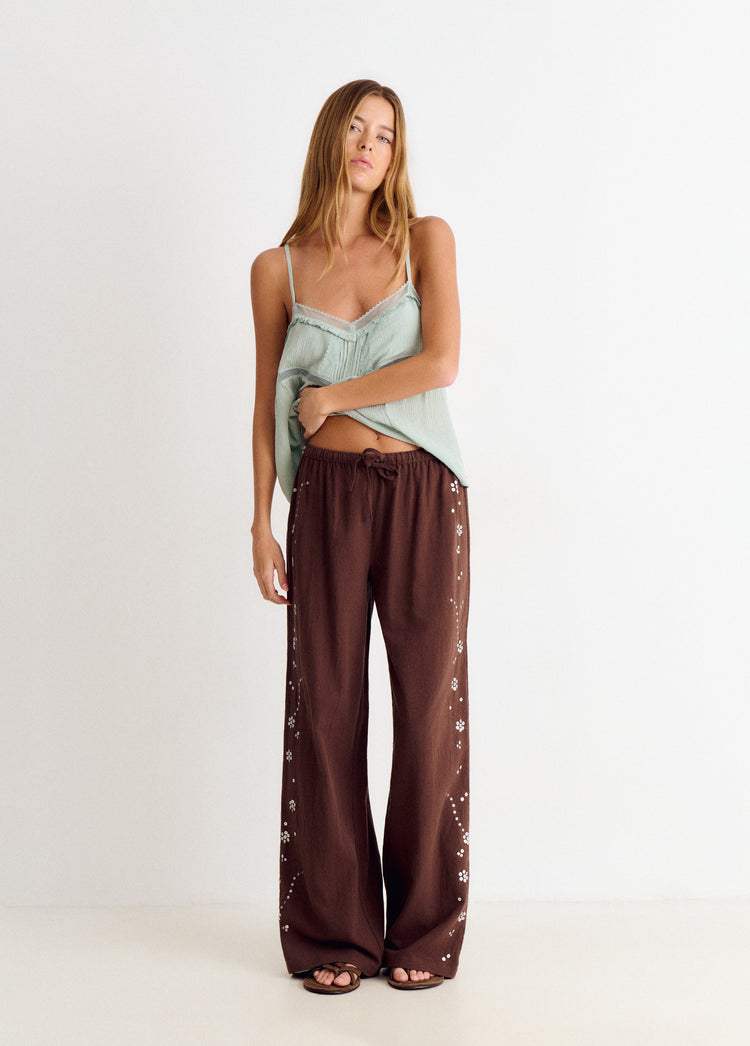 Pantalon fluide avec détails sequins sur le côté