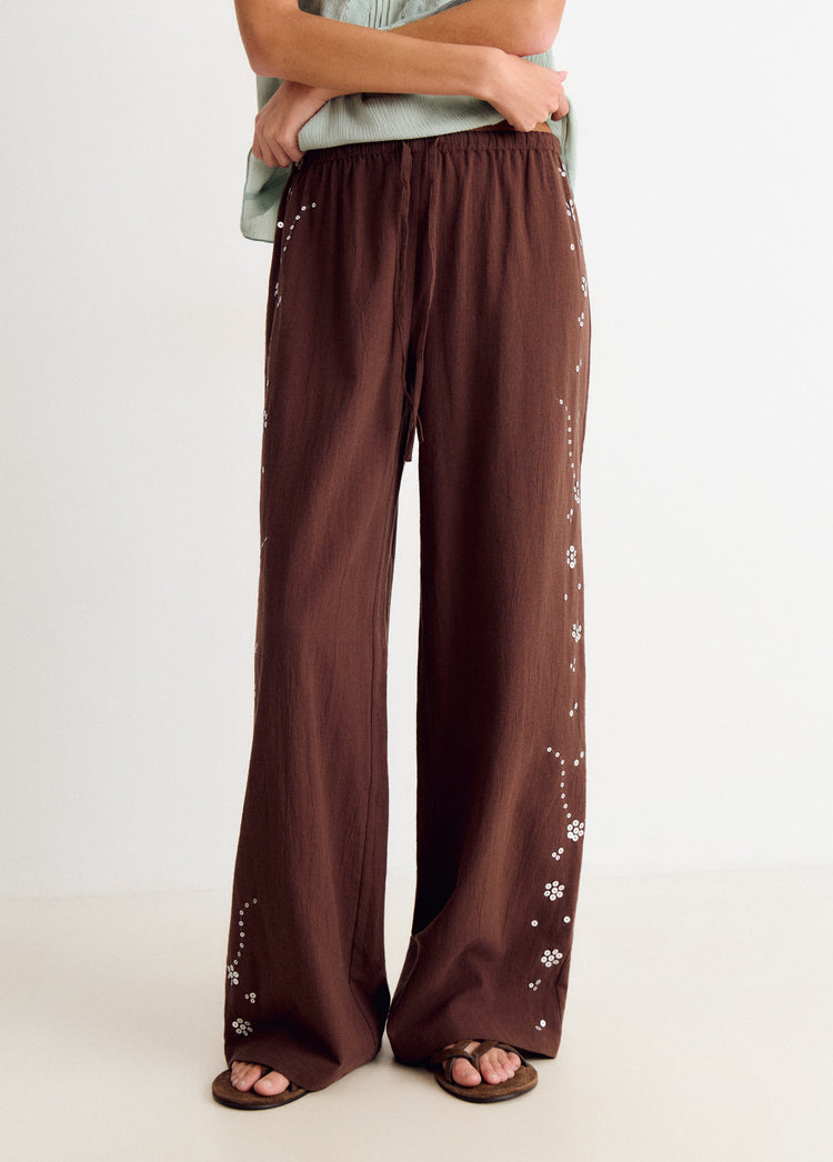 Pantalon fluide avec détails sequins sur le côté