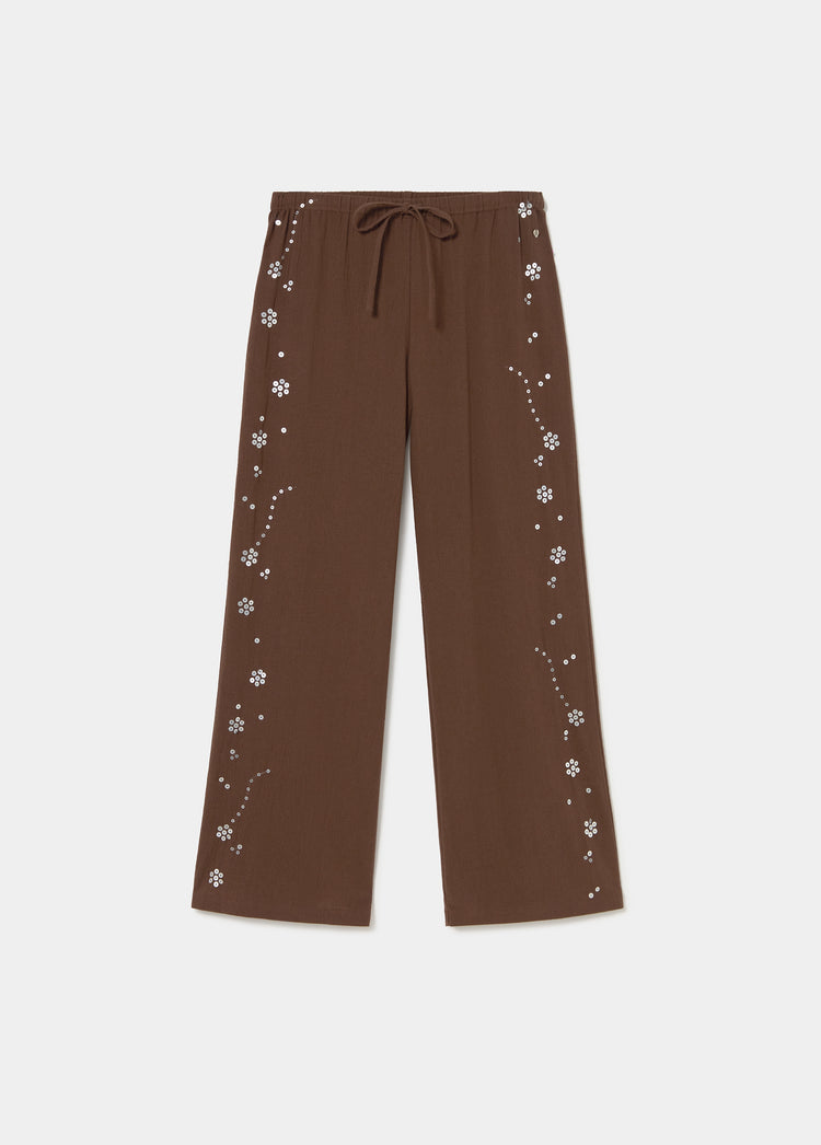 Pantalon fluide avec détails sequins sur le côté
