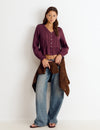 Long-sleeved ruffle blouse