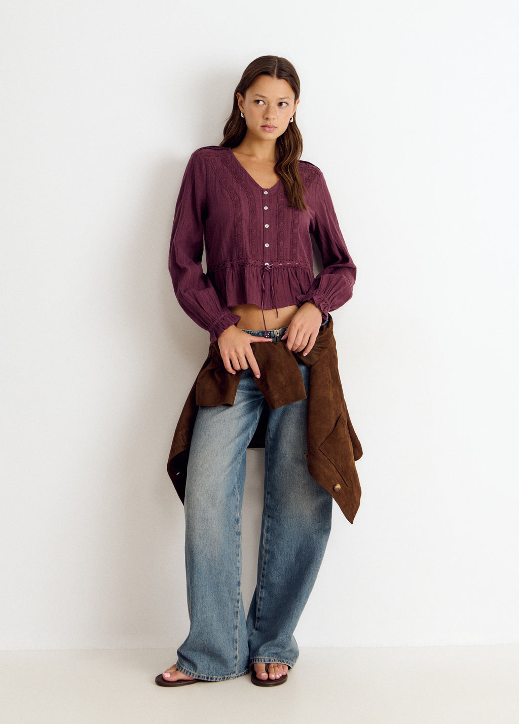 Long-sleeved ruffle blouse
