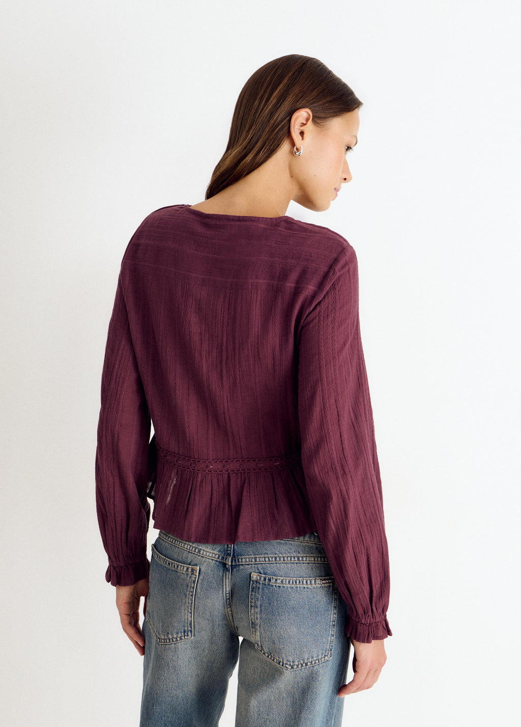 Long-sleeved ruffle blouse