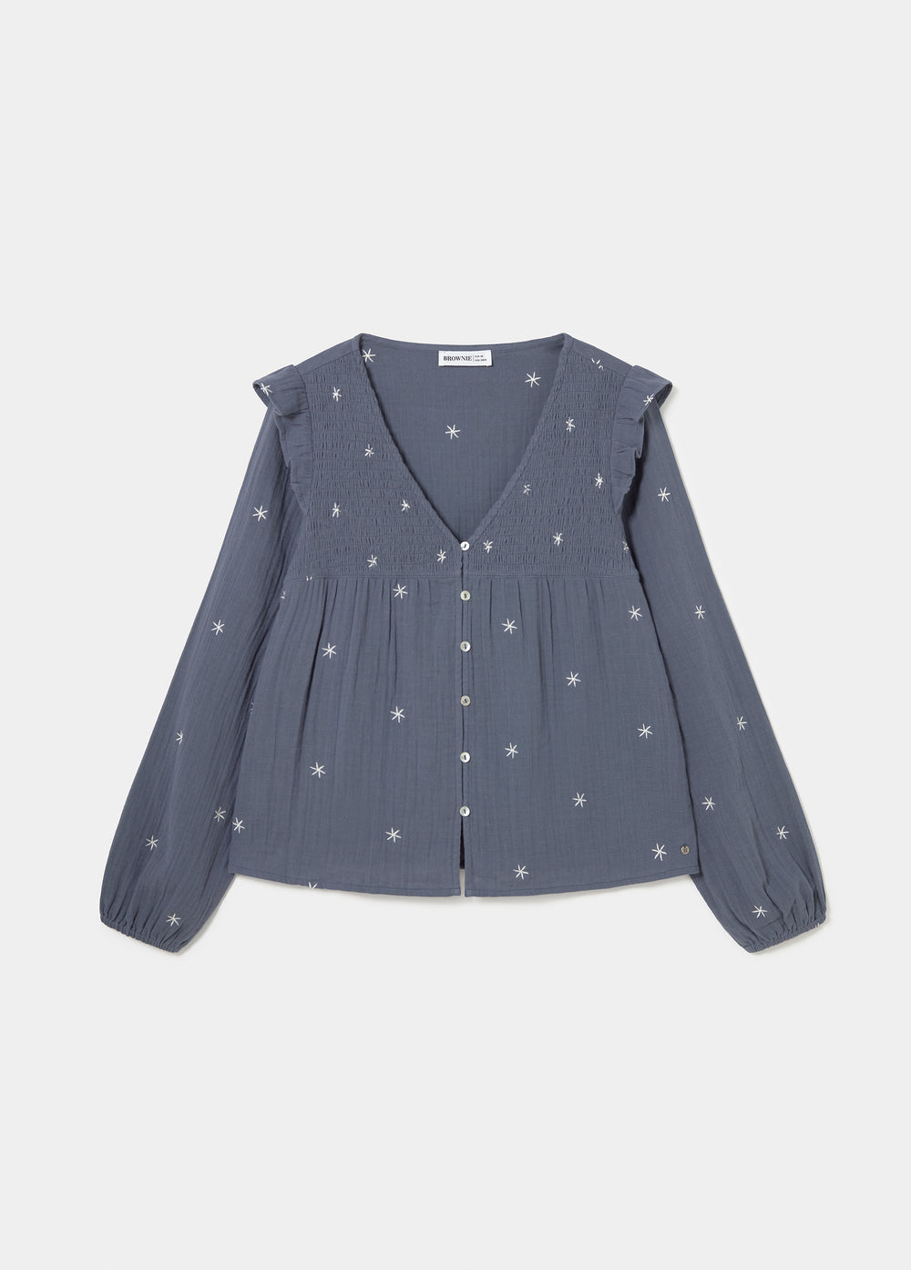 Blusa de manga larga en azul con bordados de estrellas y escote pico