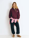 Sweatshirt com fecho e logótipo bordado